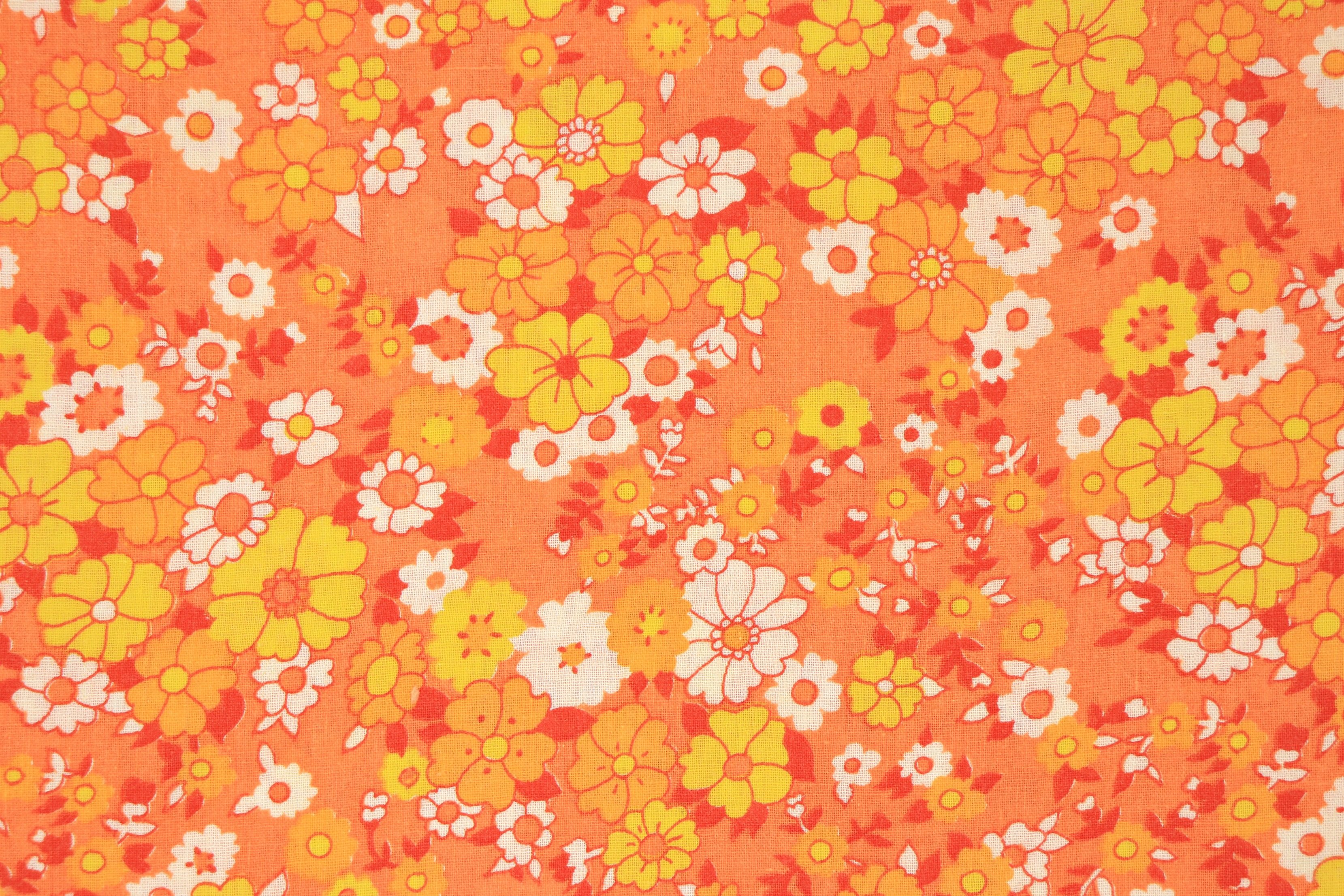 瑞々しいオレンジ系カラーの花柄レトロファブリック 幅130cm